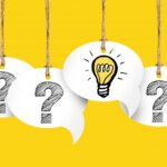 Pessoa diante da tela em branco refletindo antes de escrever